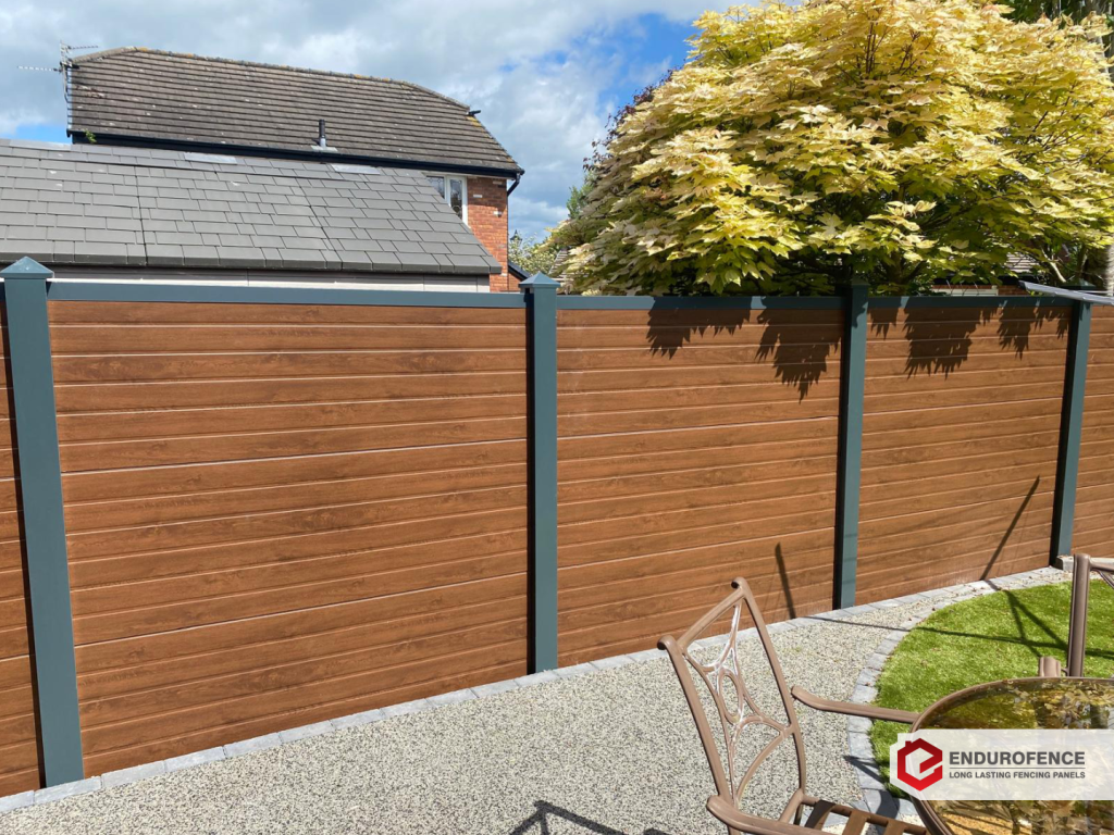 EnduroFence dark wood maintenance-free fence panels with anthracite steel post covers